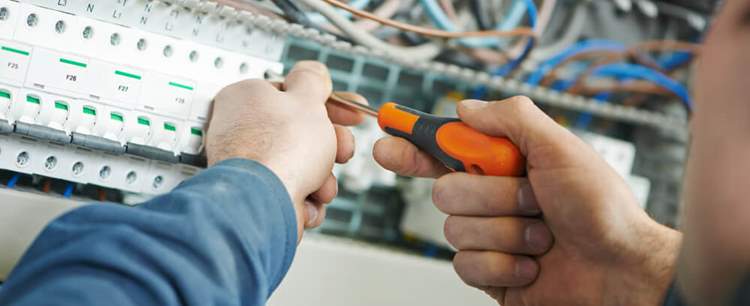 Man conducting electrical checks