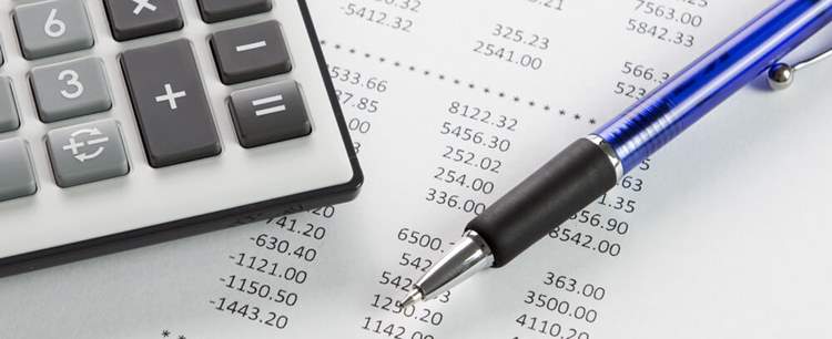 Pen and paper showing the latest mortgage figures